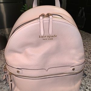 Blush Kate Spade backpack with adjustable straps